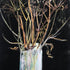 Dried plants in a glass vase against a black background_Gill Kirk_just Makers