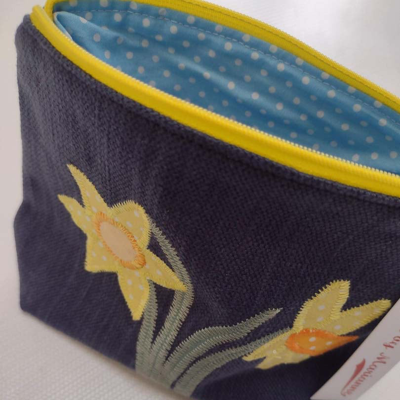 Fabric pouch with floral design and yellow zipper on a white background_Made by Marianne_Just Makers