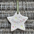 Star-shaped ceramic ornament with &