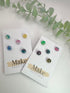 Set of colorful earrings on &