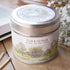 Candle tin labeled &