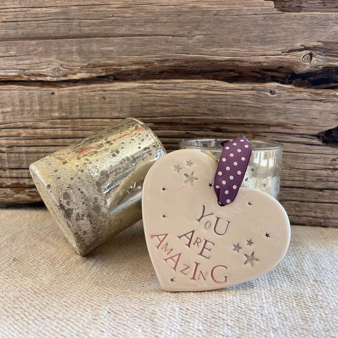 Heart-shaped ceramic plaque with &