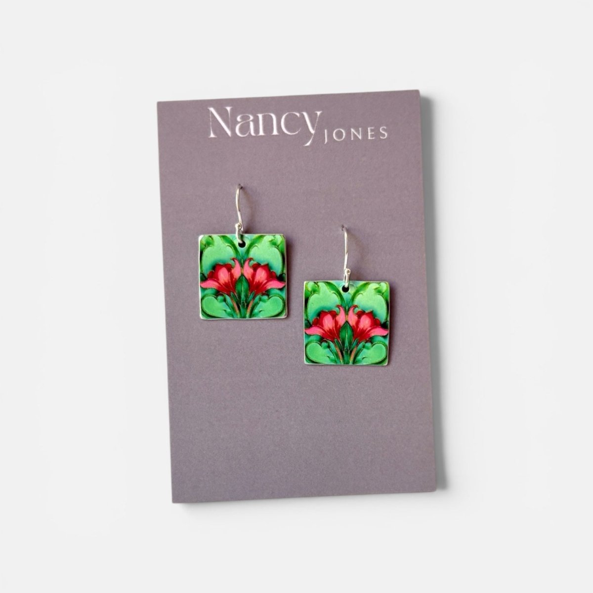 Square earrings with floral design on a Nancy Jones card