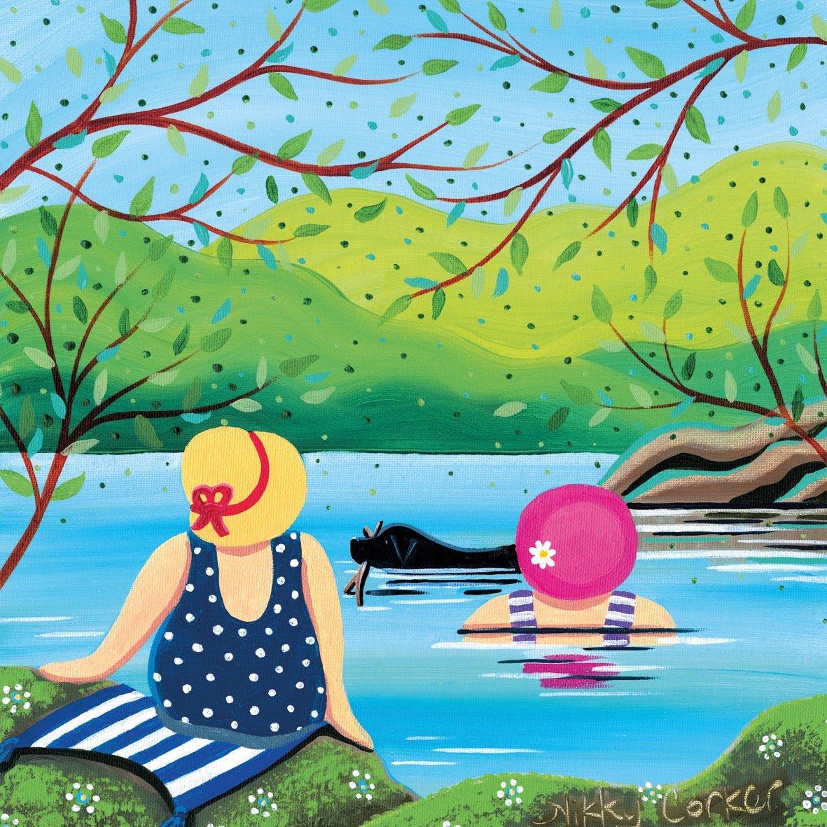 Two women in swimsuits by a lake with trees and mountains in the background.