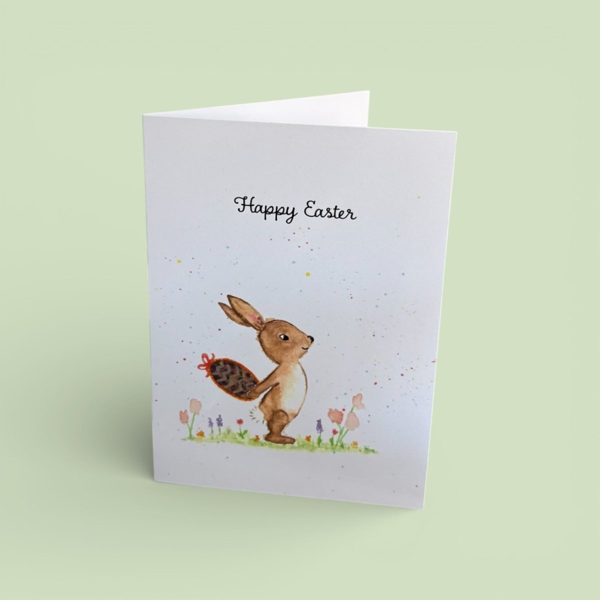 Easter card with a rabbit illustration and &