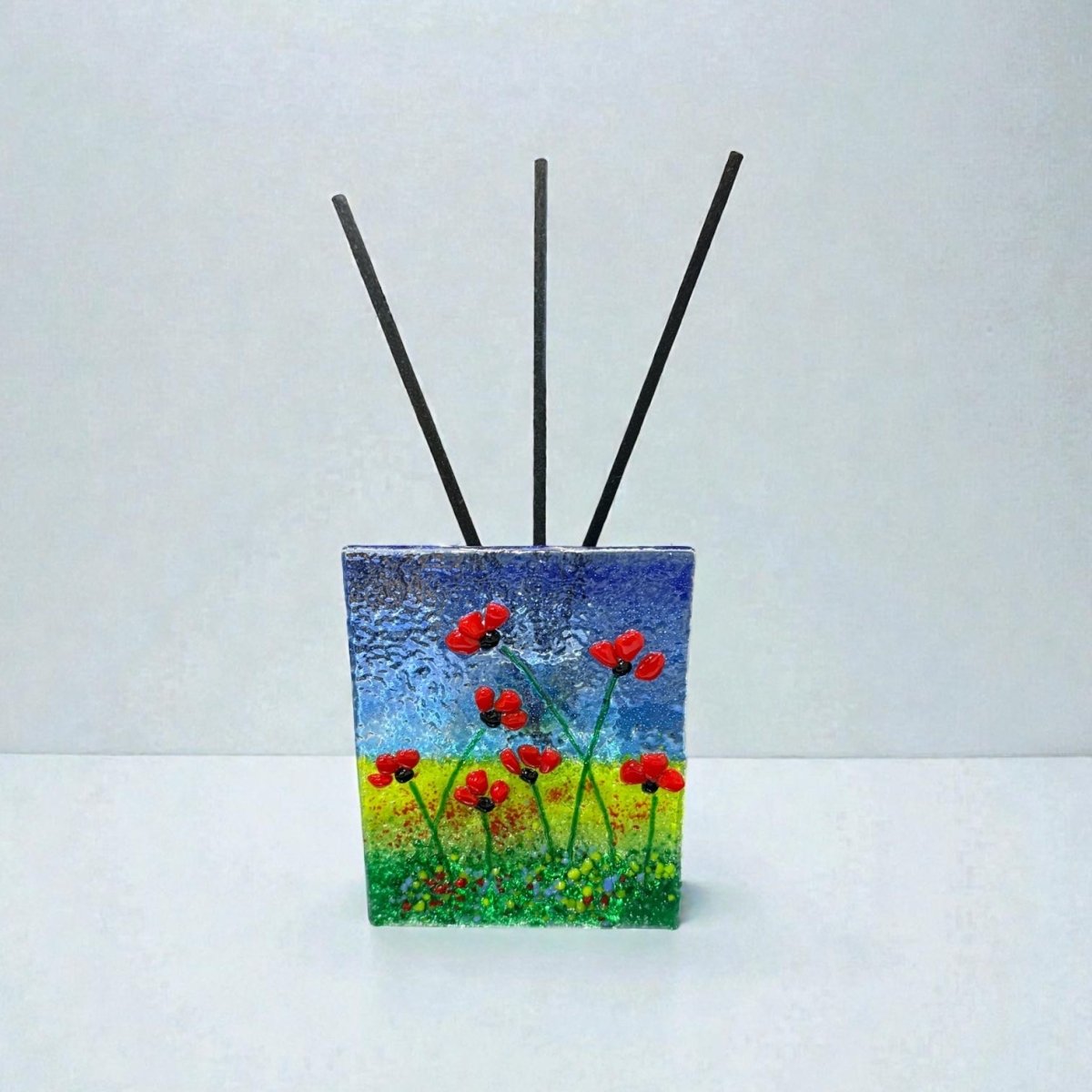 Decorative diffuser with floral design on a white background