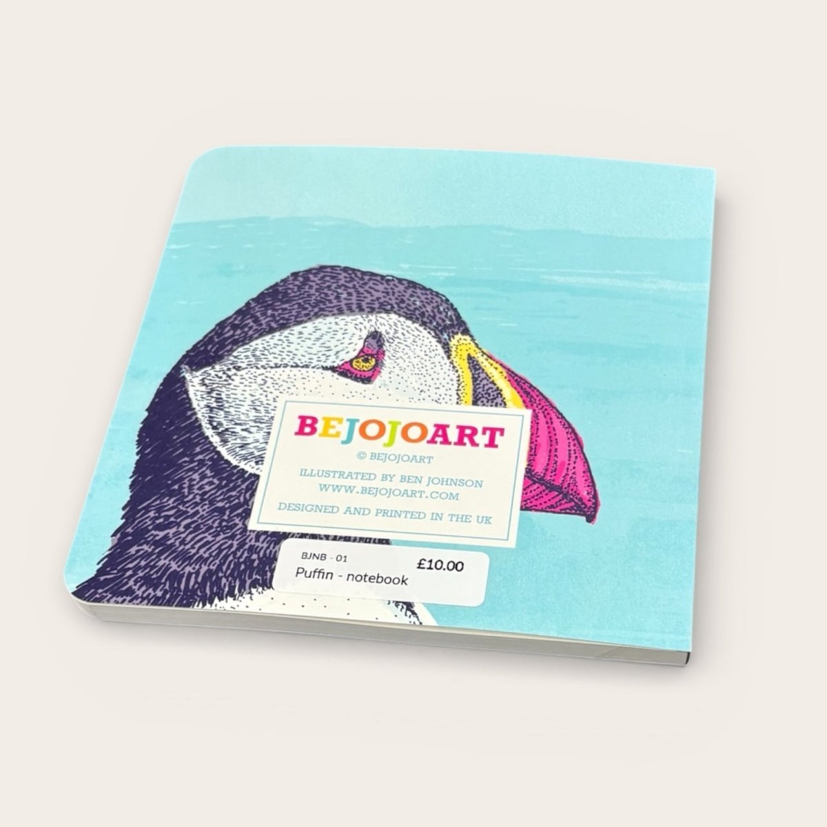 Notebook with a puffin illustration and &