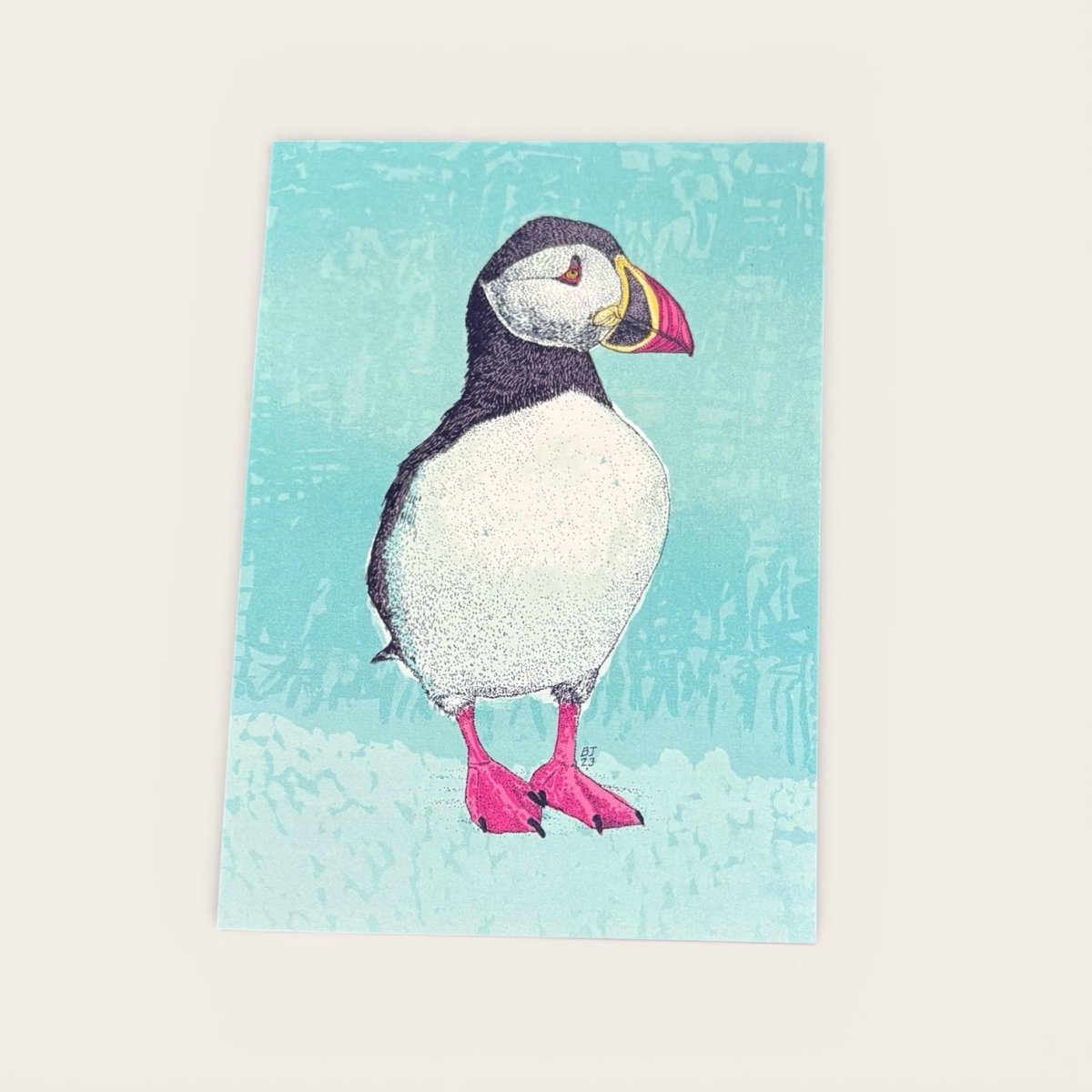 Illustration of a puffin on a textured blue background