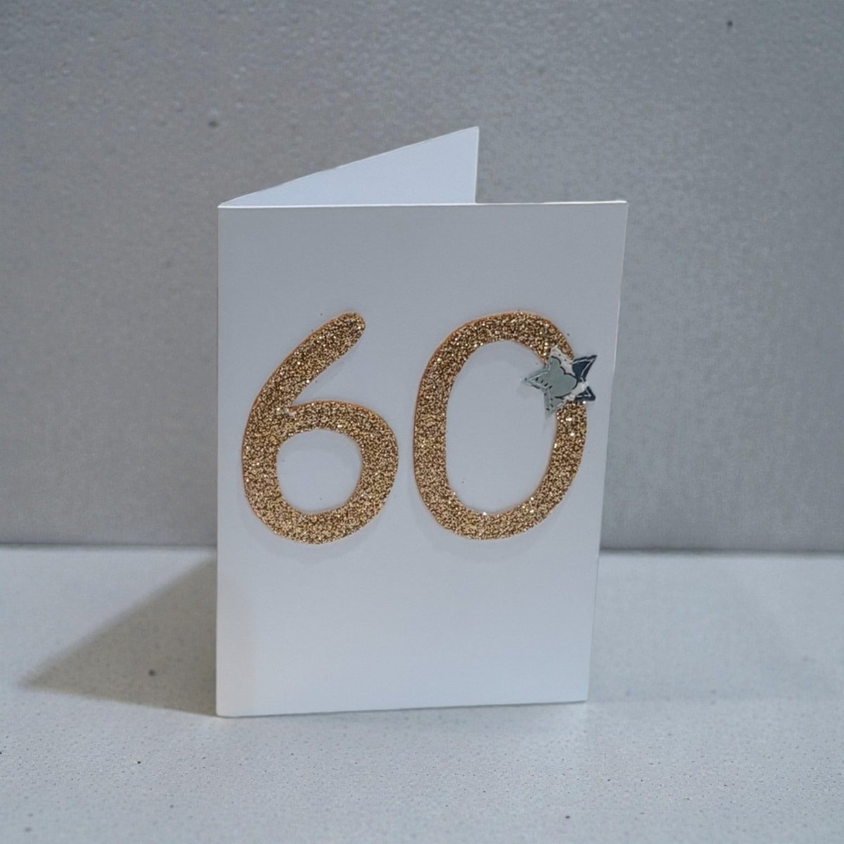 White card with gold glitter &