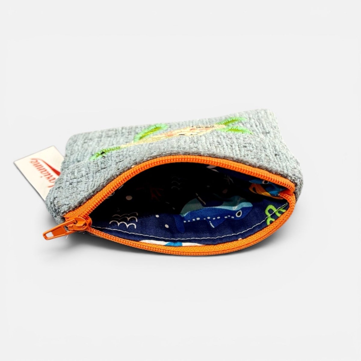 Small pouch with orange zipper on a white background