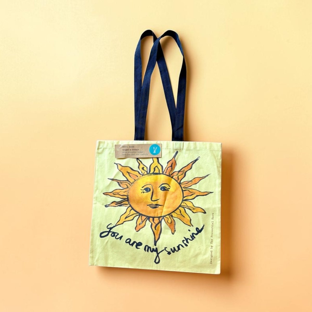 Tote bag with sun design and &