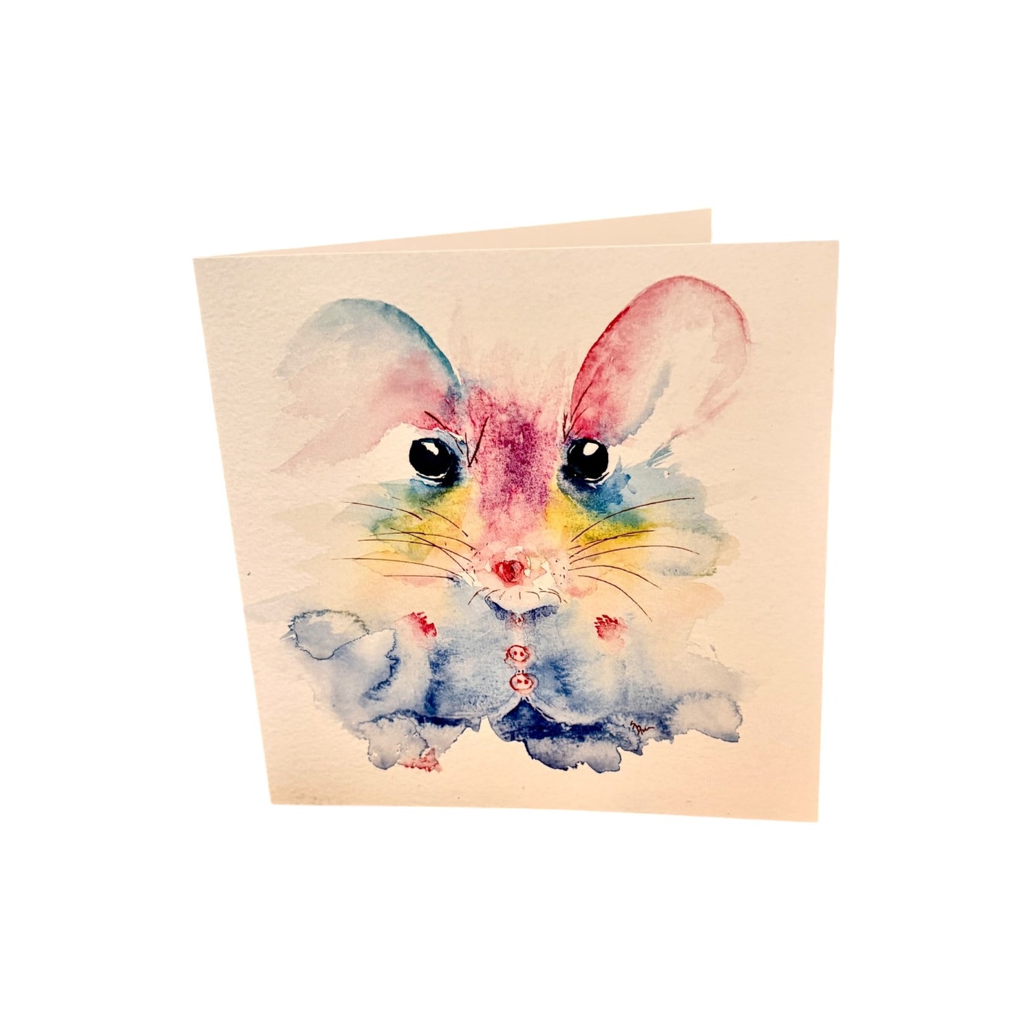 A square greeting card featuring a colorful watercolor illustration of a rabbit in a blue outfit, set against a plain white background.