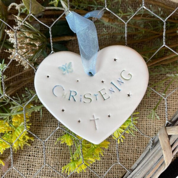 Heart-shaped ceramic ornament with &
