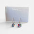 Floral hoop earrings on a Nancy Jones card
