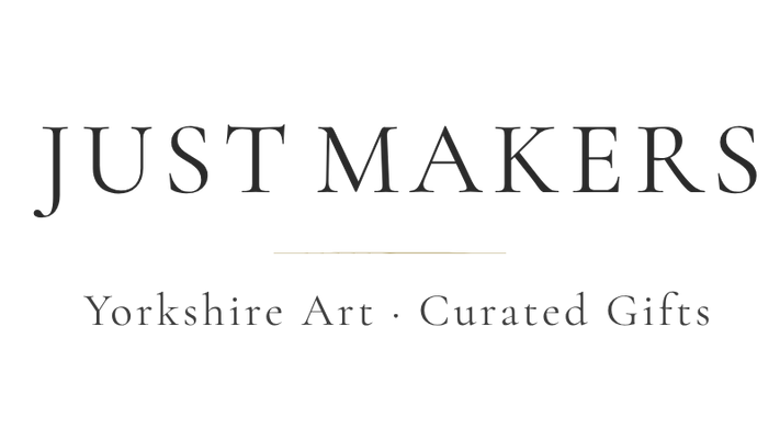 Logo of 'Just Makers' with text 'Yorkshire Art · Curated Gifts' on a white background