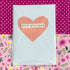 Card with a pink heart and &
