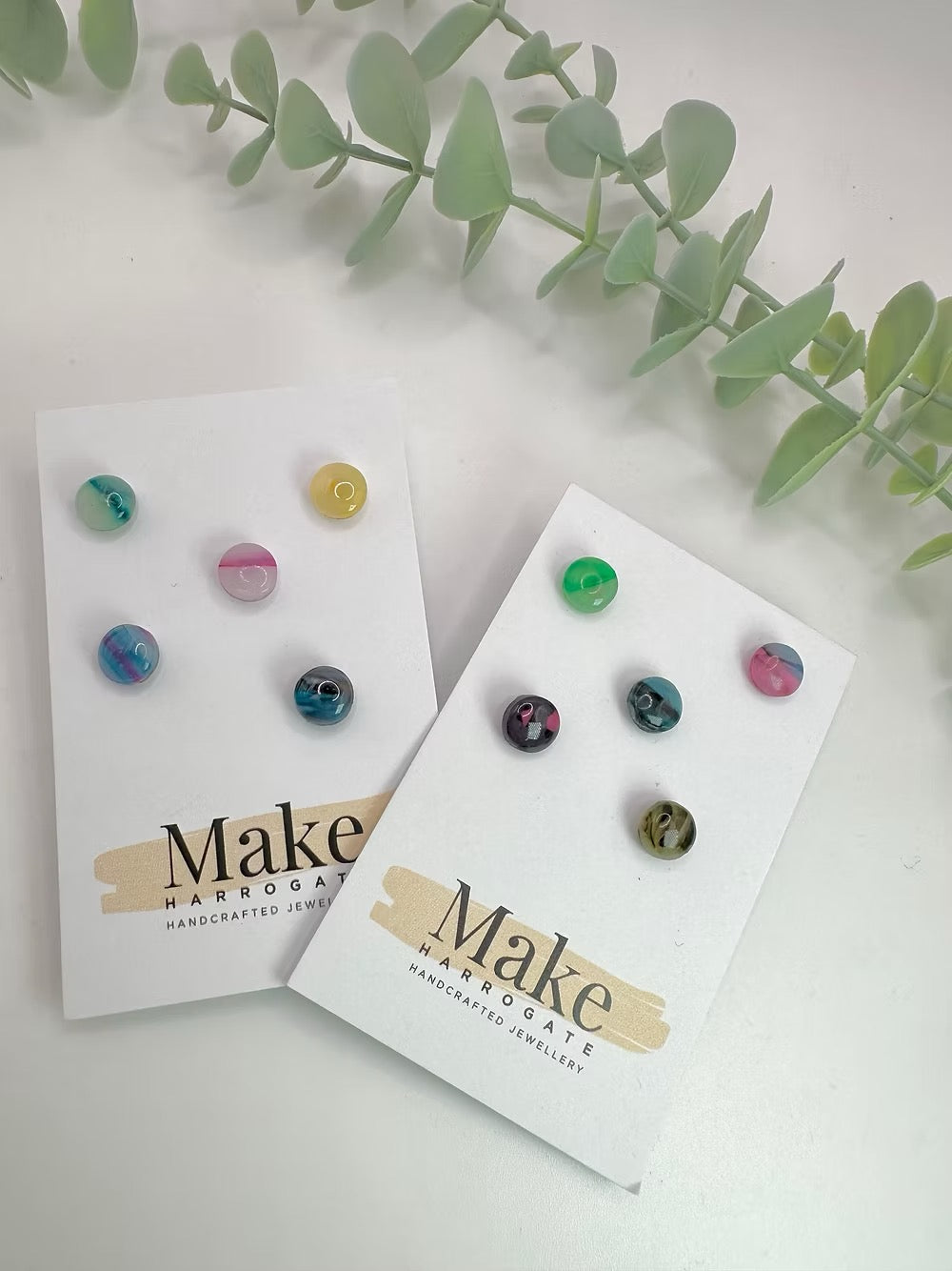 Set of colorful earrings on &