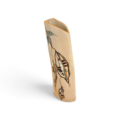 A tall, narrow ceramic vase with a curved, open-top shape, featuring a hand-painted botanical design of a seed pod with red and yellow details on a warm beige background.