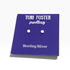 A pair of sterling silver stud earrings displayed on a purple backing card that reads &