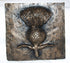 A square bronze wall plaque featuring a raised thistle design with textured metallic surfaces and a rustic finish, photographed against a plain white background.