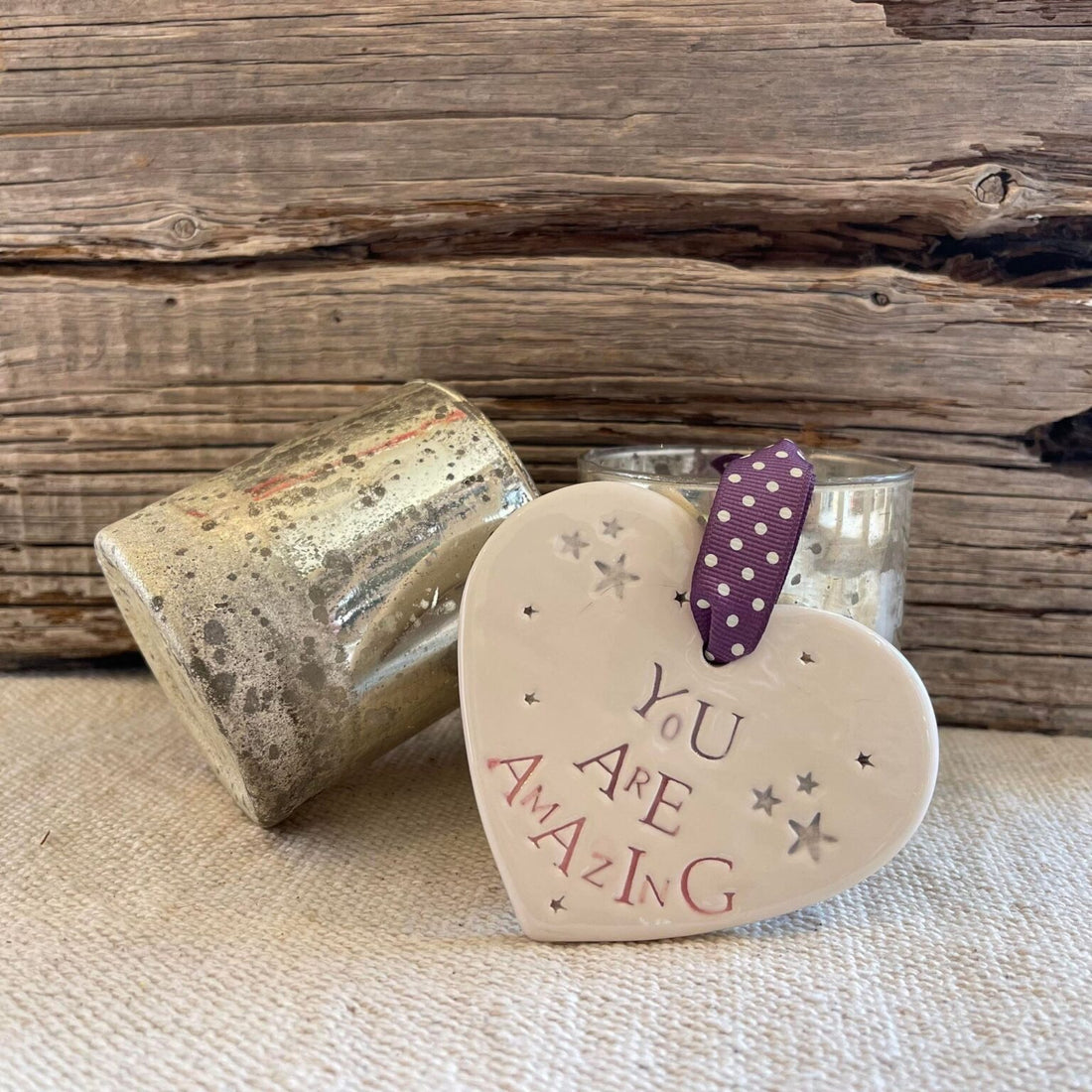 Heart-shaped ceramic plaque with &