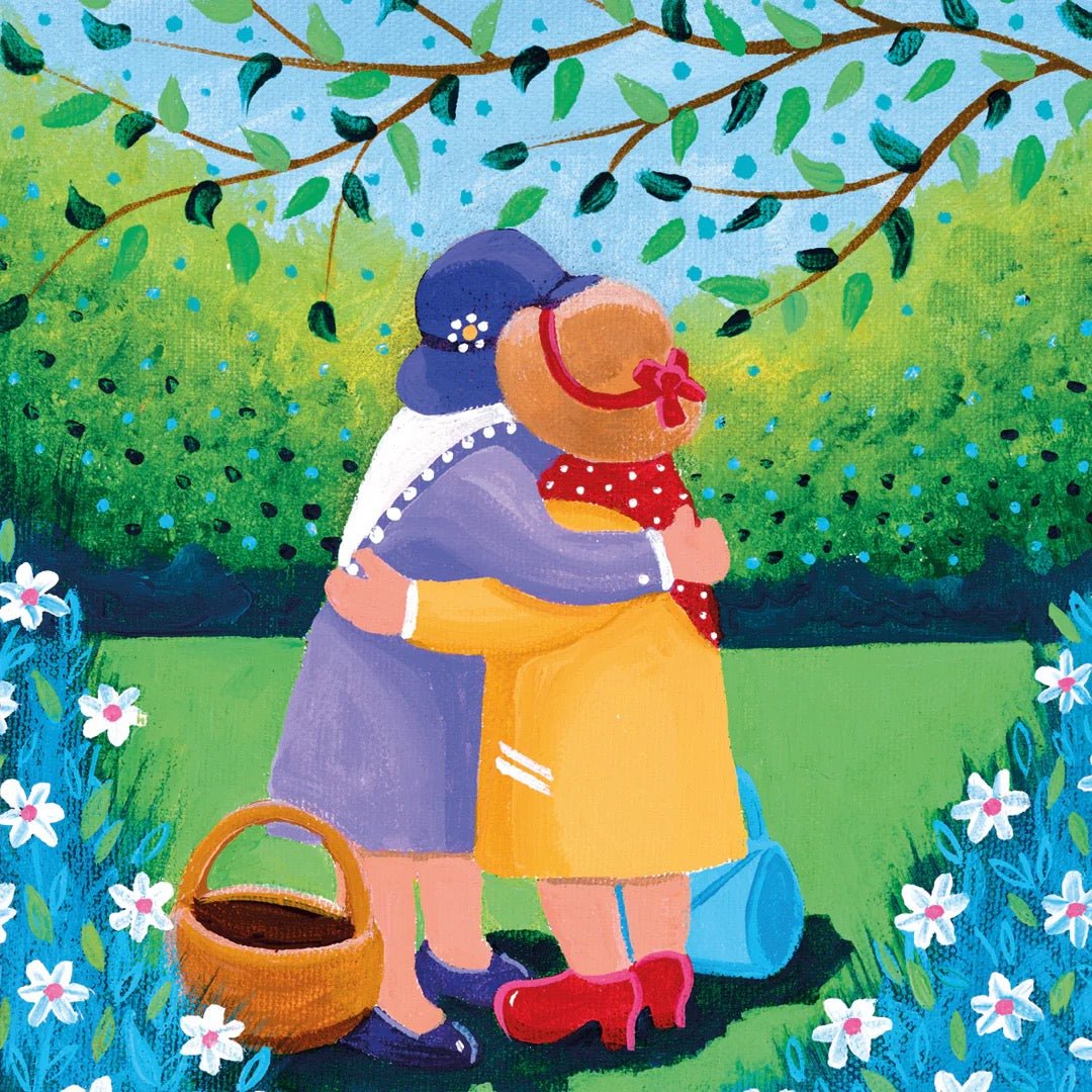 Two people hugging under a tree with flowers and greenery around
