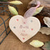 Heart-shaped ornament with &