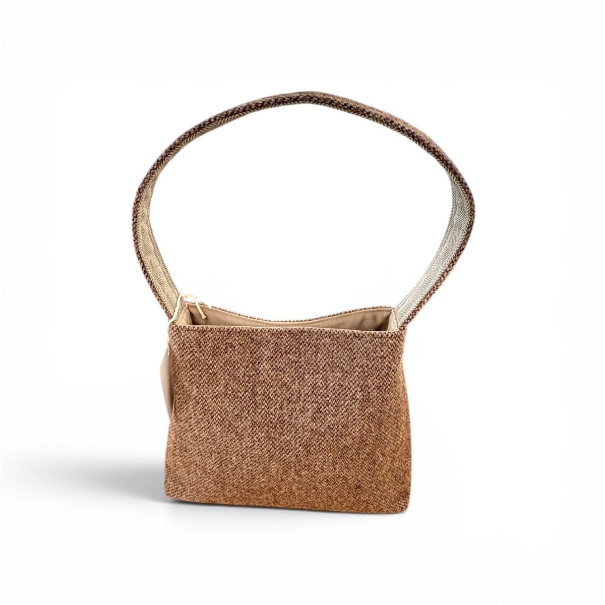 A small structured shoulder bag made from brown herringbone fabric, featuring a matching woven strap and a light beige interior lining, shown against a plain white background.