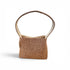 A small structured shoulder bag made from brown herringbone fabric, featuring a matching woven strap and a light beige interior lining, shown against a plain white background.