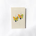 Butterfly earrings on a Nancy Jones branded card against a white background