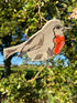 Wall hung ceramic robin with wire legs by Yorkshire ceramic artist Ciara McClarence