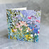 Greeting card with floral design on a textured surface