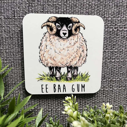 Coaster with a sheep illustration and &