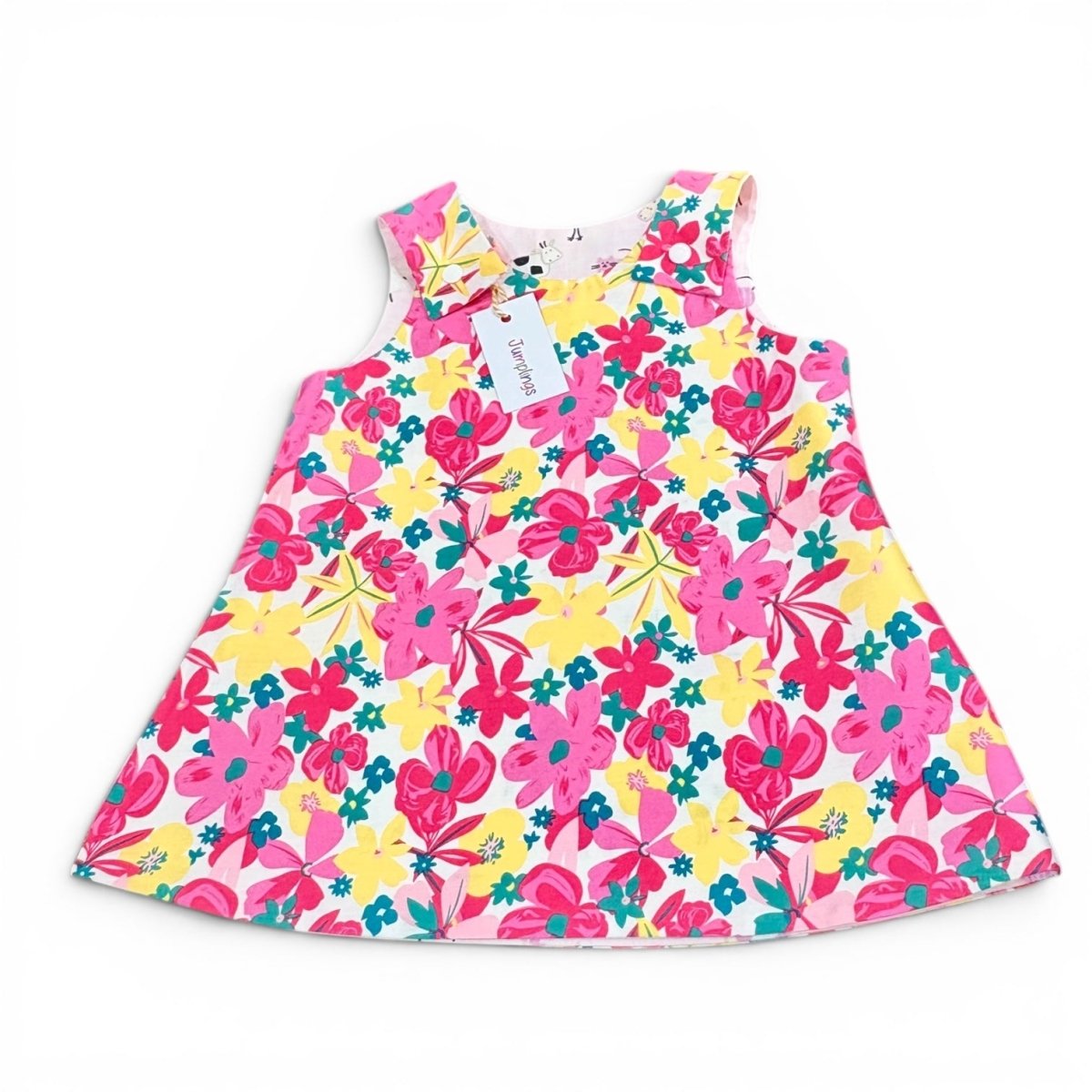 Floral dress with pink, yellow, and blue flowers on a white background