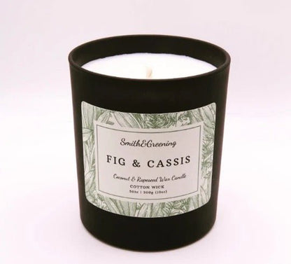 Candle with a label reading &