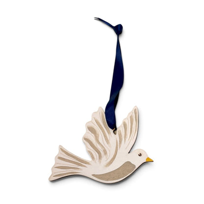 A wooden bird-shaped hanging ornament with wings spread, featuring a dark navy blue ribbon loop at the top, a small yellow beak, and subtle brown linework details on a plain white background.