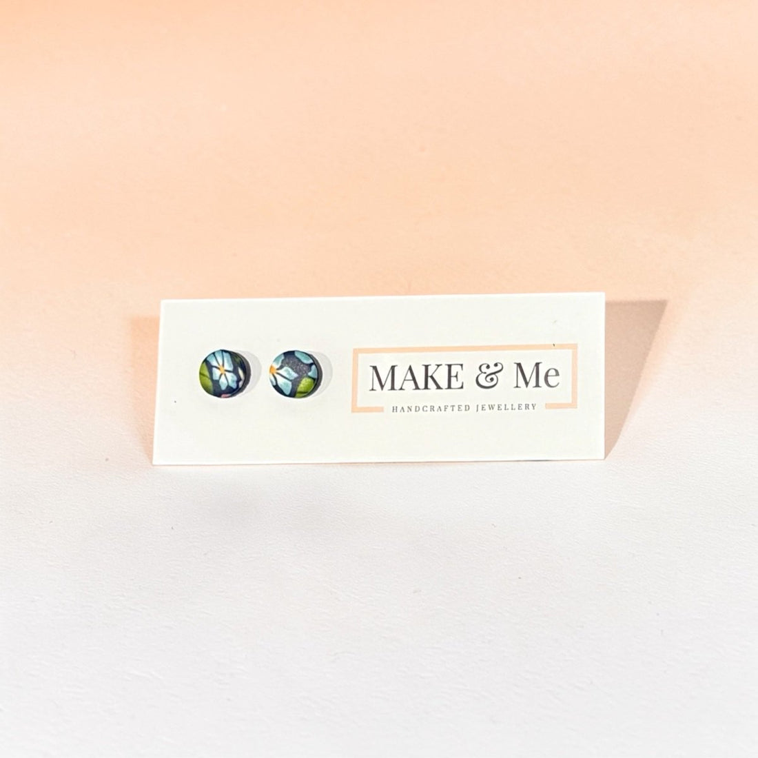 Make &amp; Me jewelry card with earrings on a light background