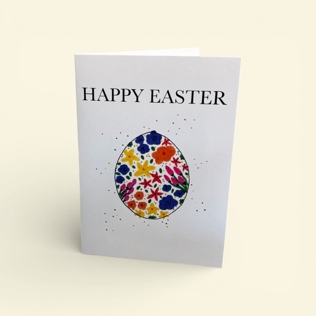 Greeting card with floral Easter egg design and &