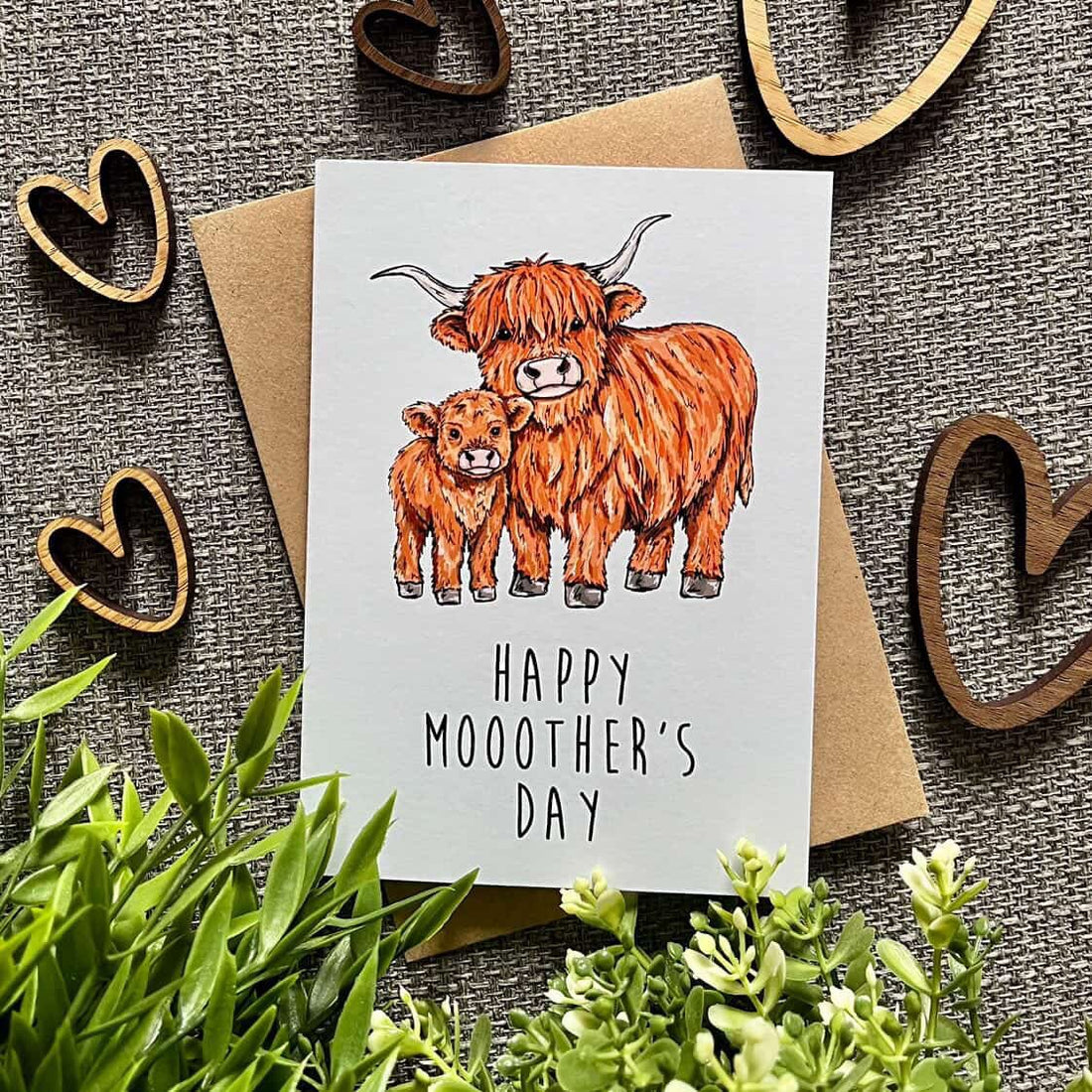 Card with highland cow illustration and &