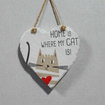 Heart-shaped sign with a cat illustration and text &
