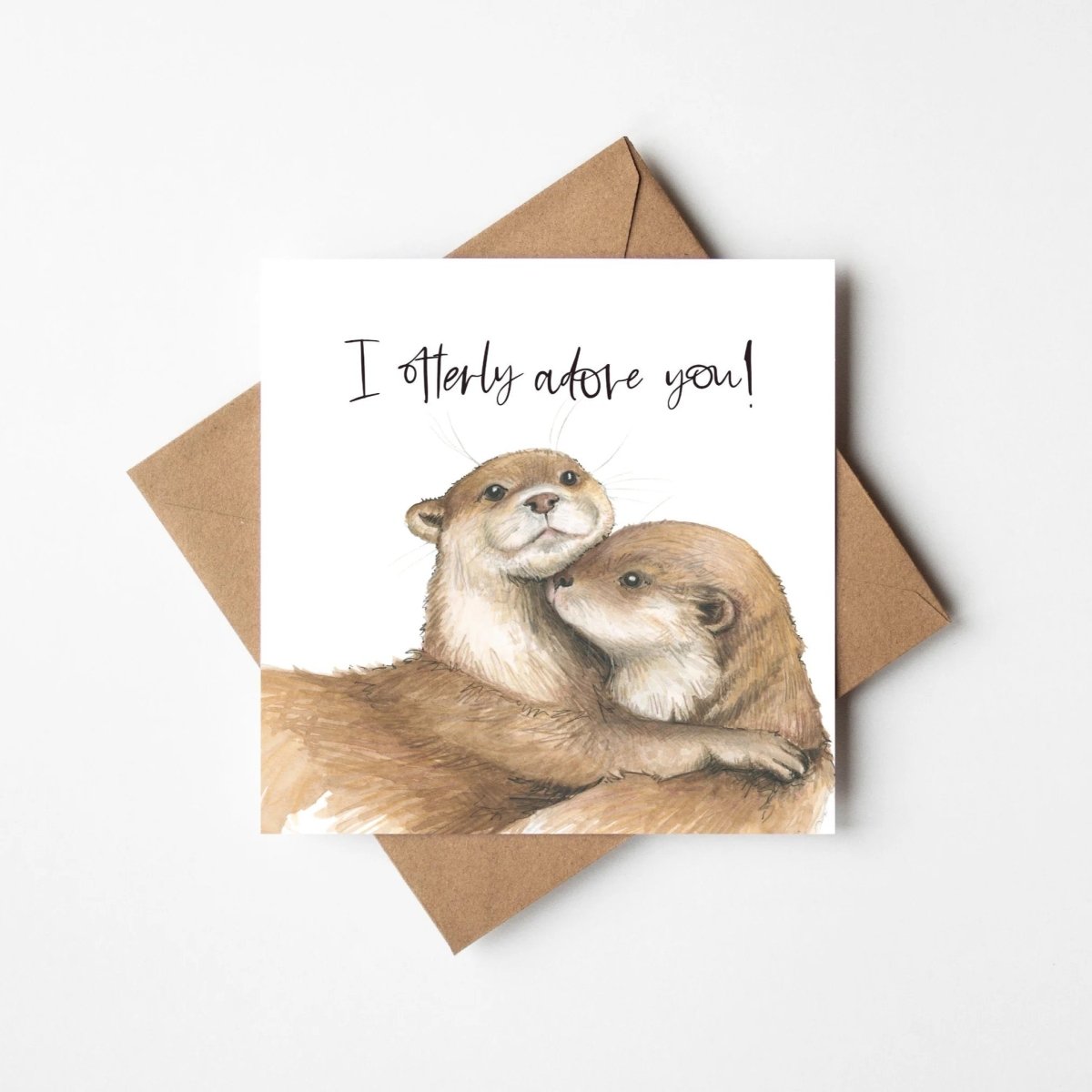 Greeting card with two otters and &