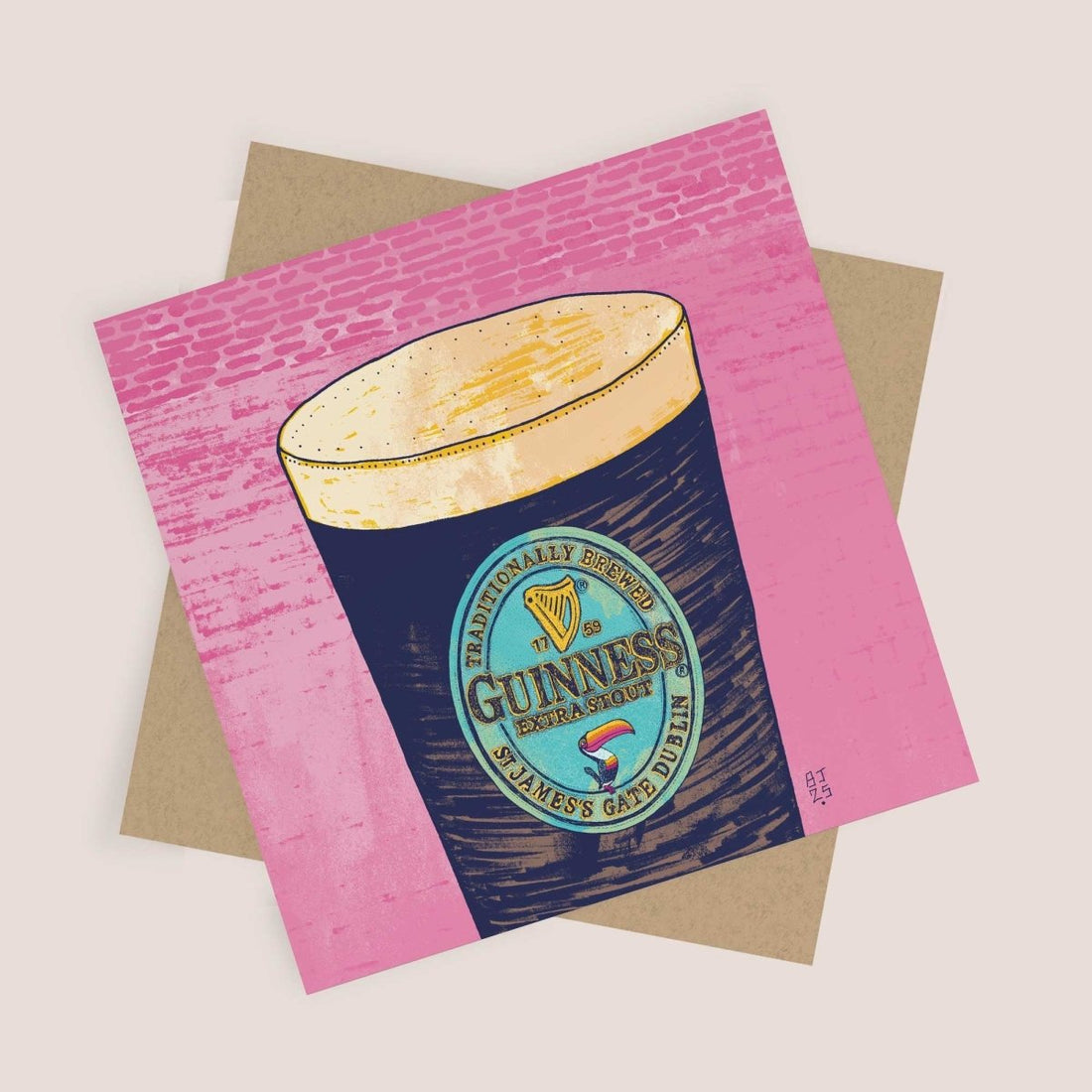 Greeting card with Guinness beer label design on a pink and brown background