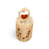 A small cylindrical ceramic keepsake box with a lid, decorated with red heart-shaped flowers on a beige background, featuring a heart-shaped ring topper with a red heart in the center, set against a plain white background.