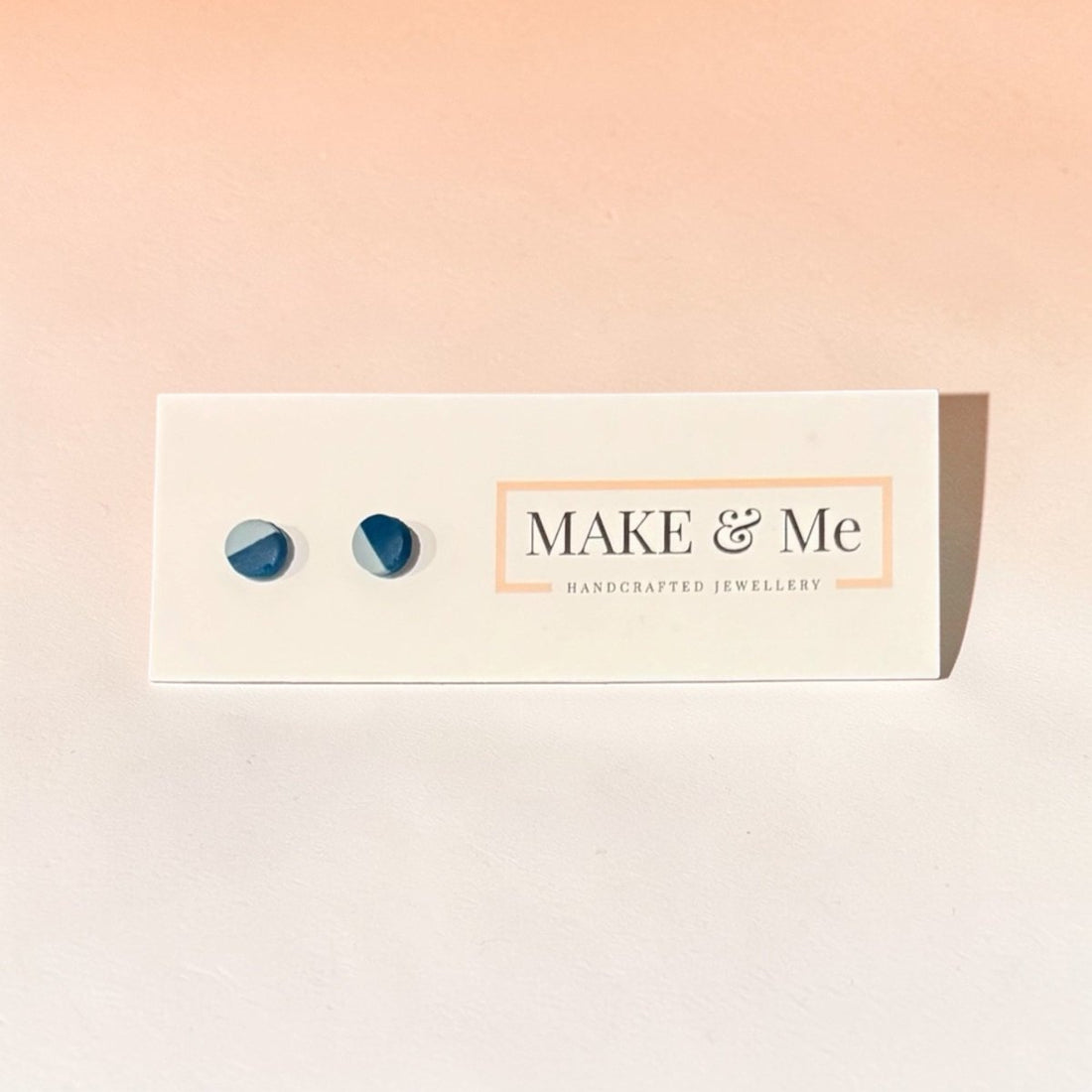 Make &amp; Me handcrafted jewelry box with blue earrings on a gradient background