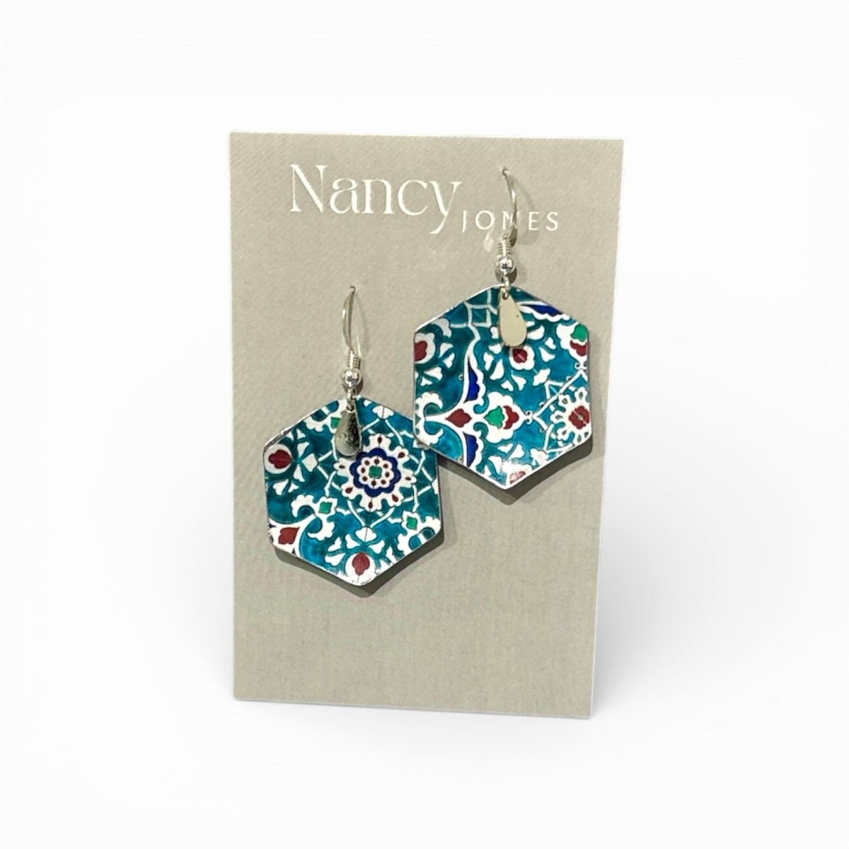 Hexagonal patterned earrings on a Nancy Jones card