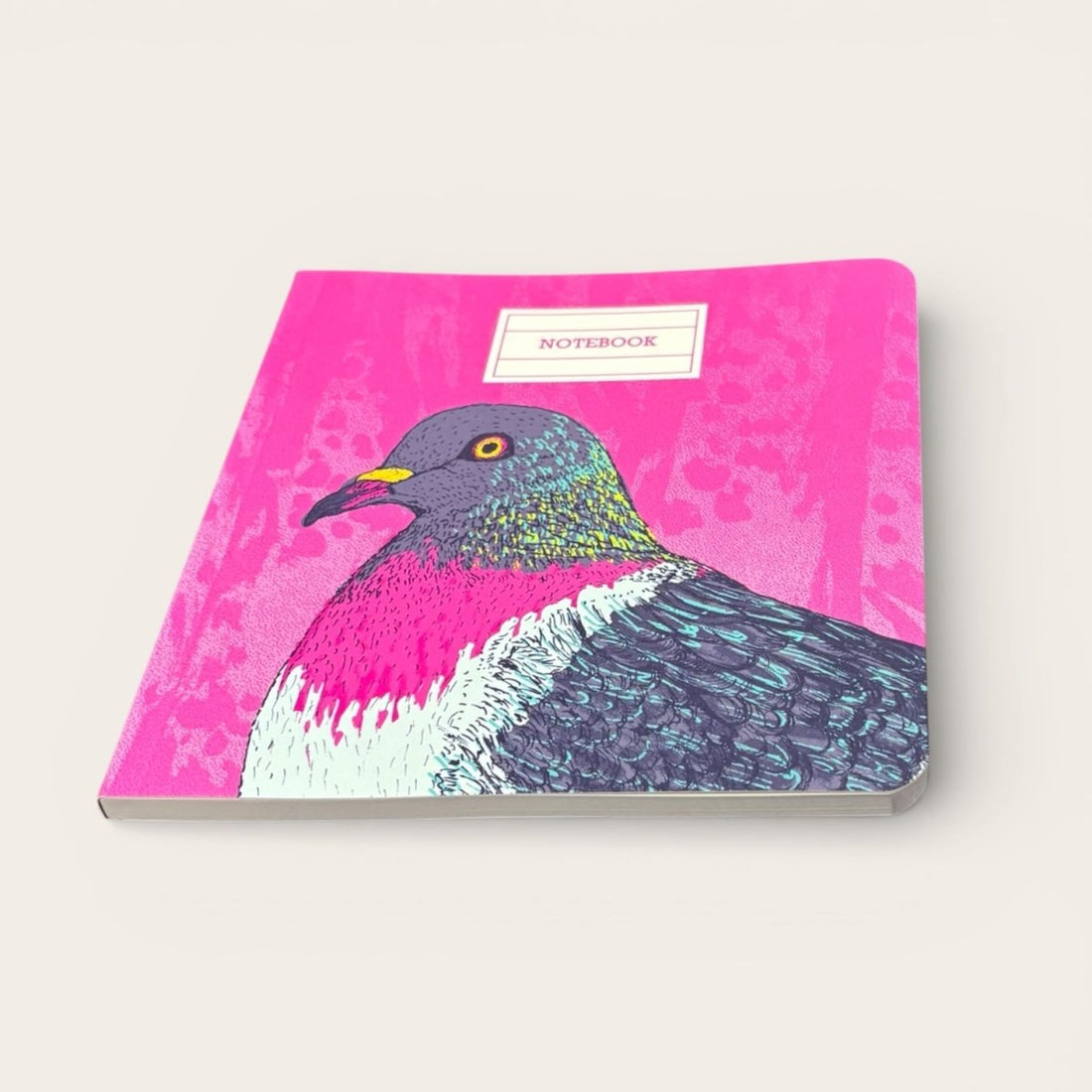 Notebook with a pigeon design on a pink background