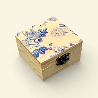 Wooden box with floral design on a beige background