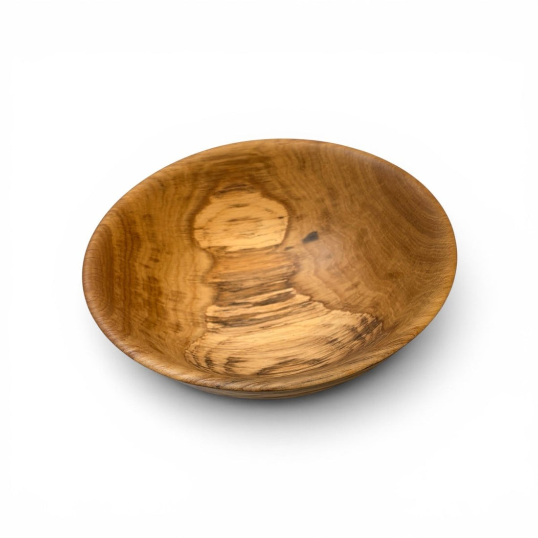 A round wooden bowl with a polished finish, showcasing natural wood grain patterns in warm brown and golden tones, set against a plain white background.