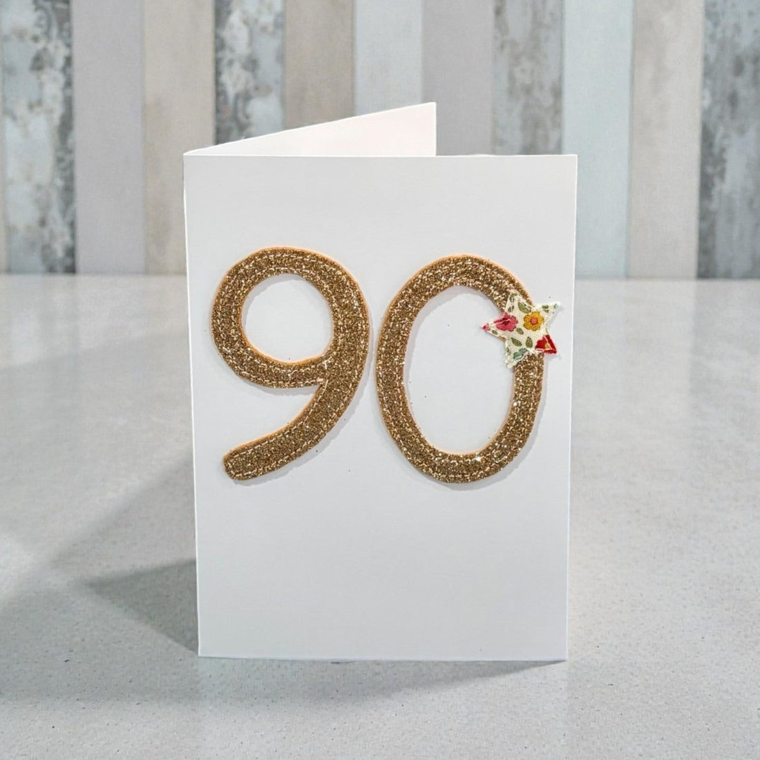 White card with gold glitter &