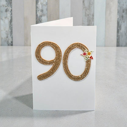 White card with gold glitter &